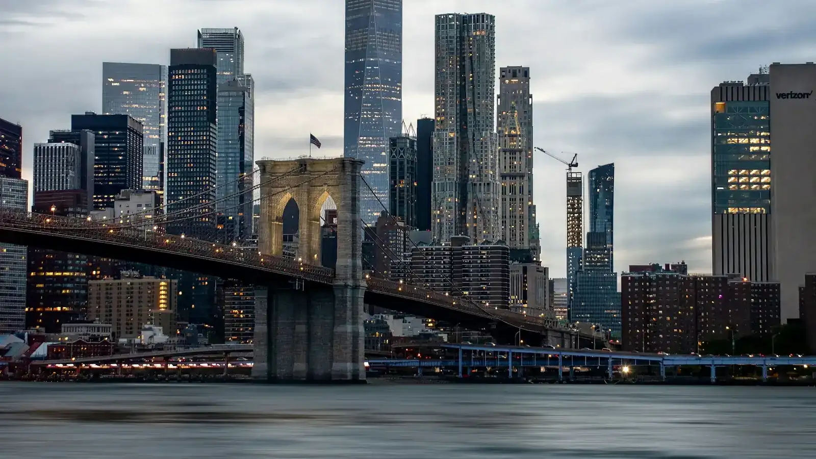 The Manhattan skyline and Brooklyn Bridge at dusk